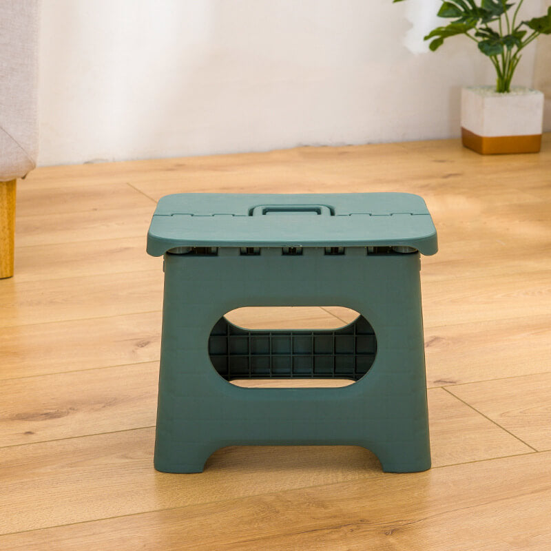 "Compact folding step stool with handle; durable plastic, various colors; perfect for kids and adults in any space."