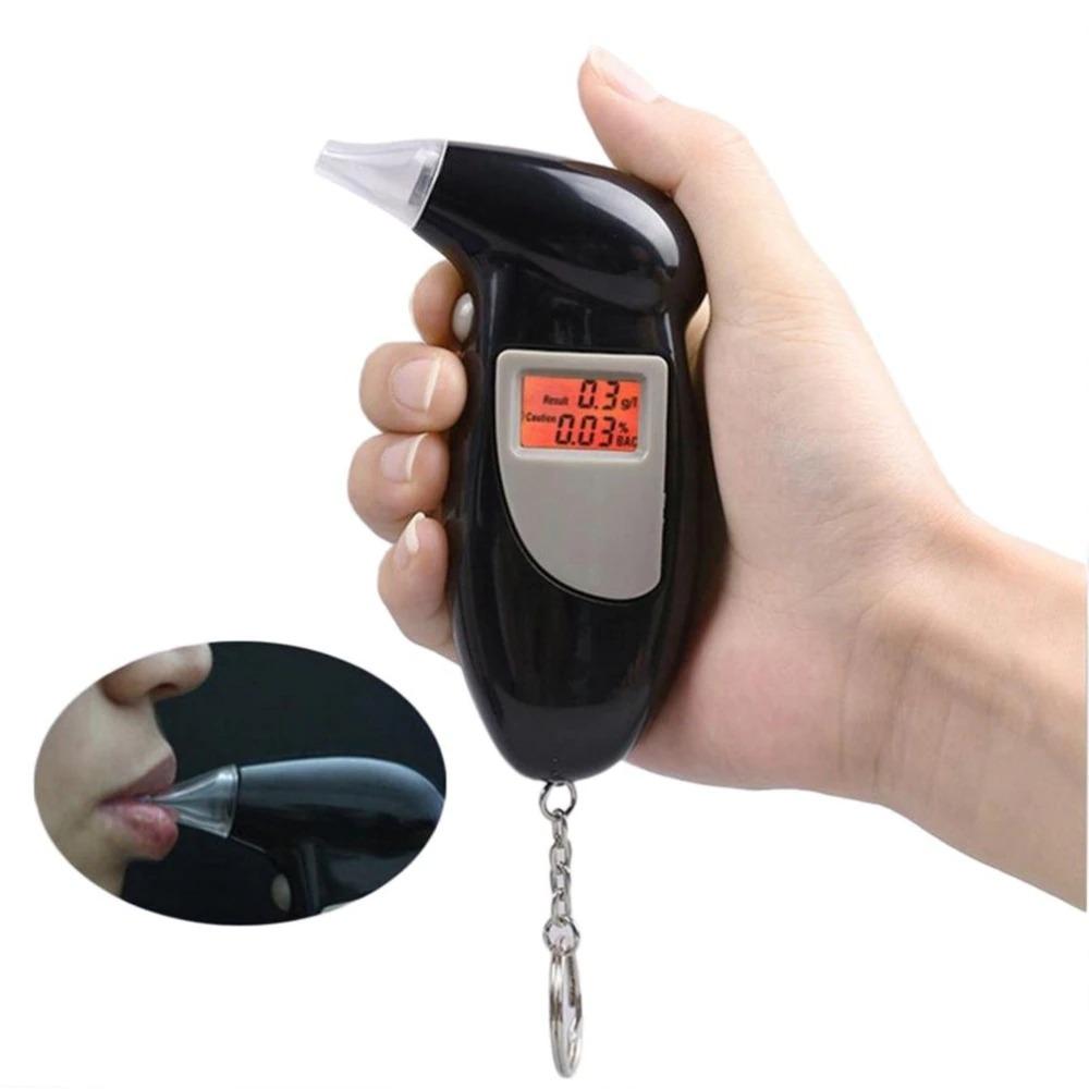 "Compact portable breathalyzer with LCD display and key ring for accurate alcohol testing; essential for personal safety."