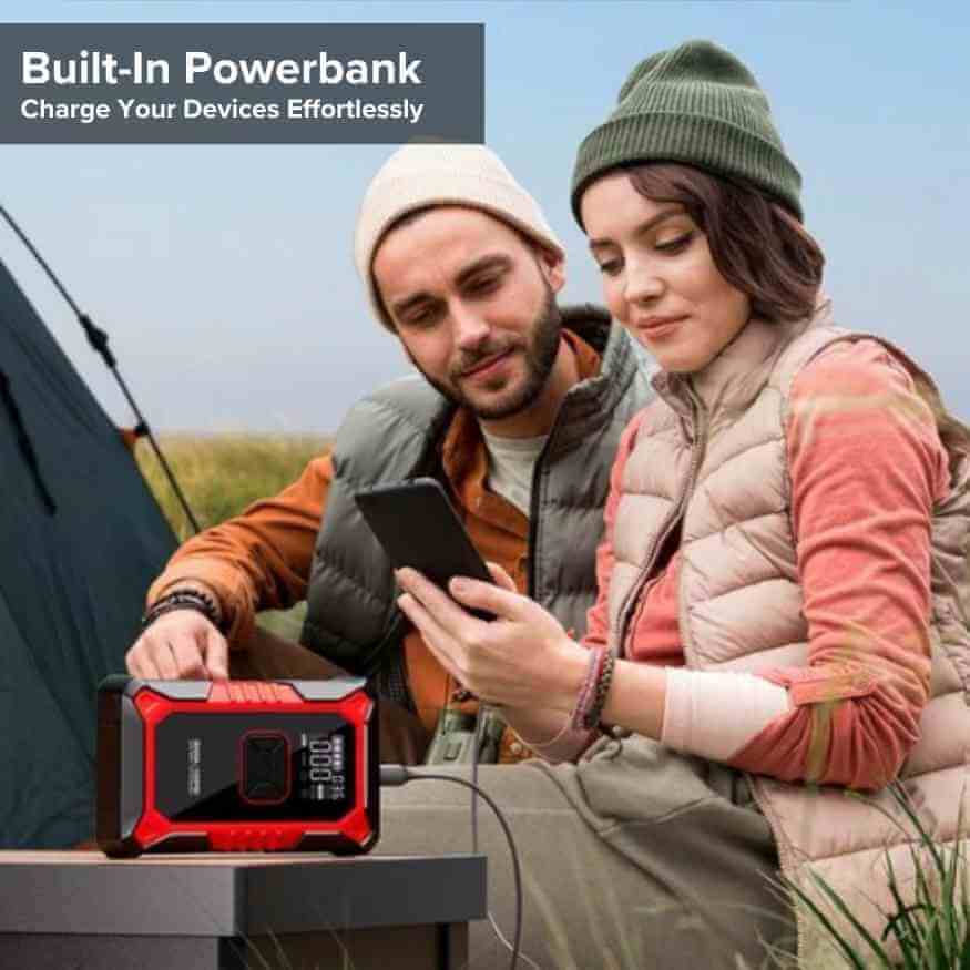 "Compact portable jump starter with built-in air compressor and USB ports, ideal roadside tool for cars and trucks."