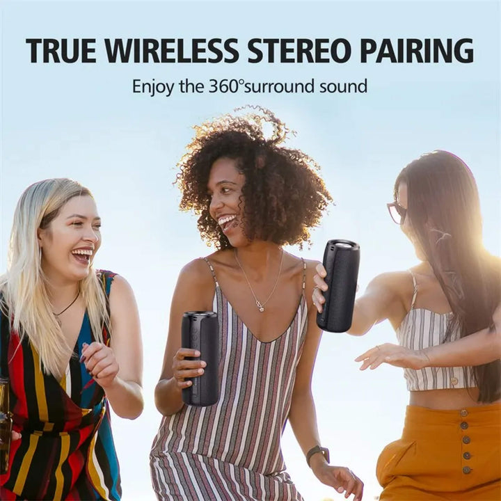 "Compact waterproof Bluetooth wireless speaker; sleek black design, portable, ideal for indoor and outdoor use."