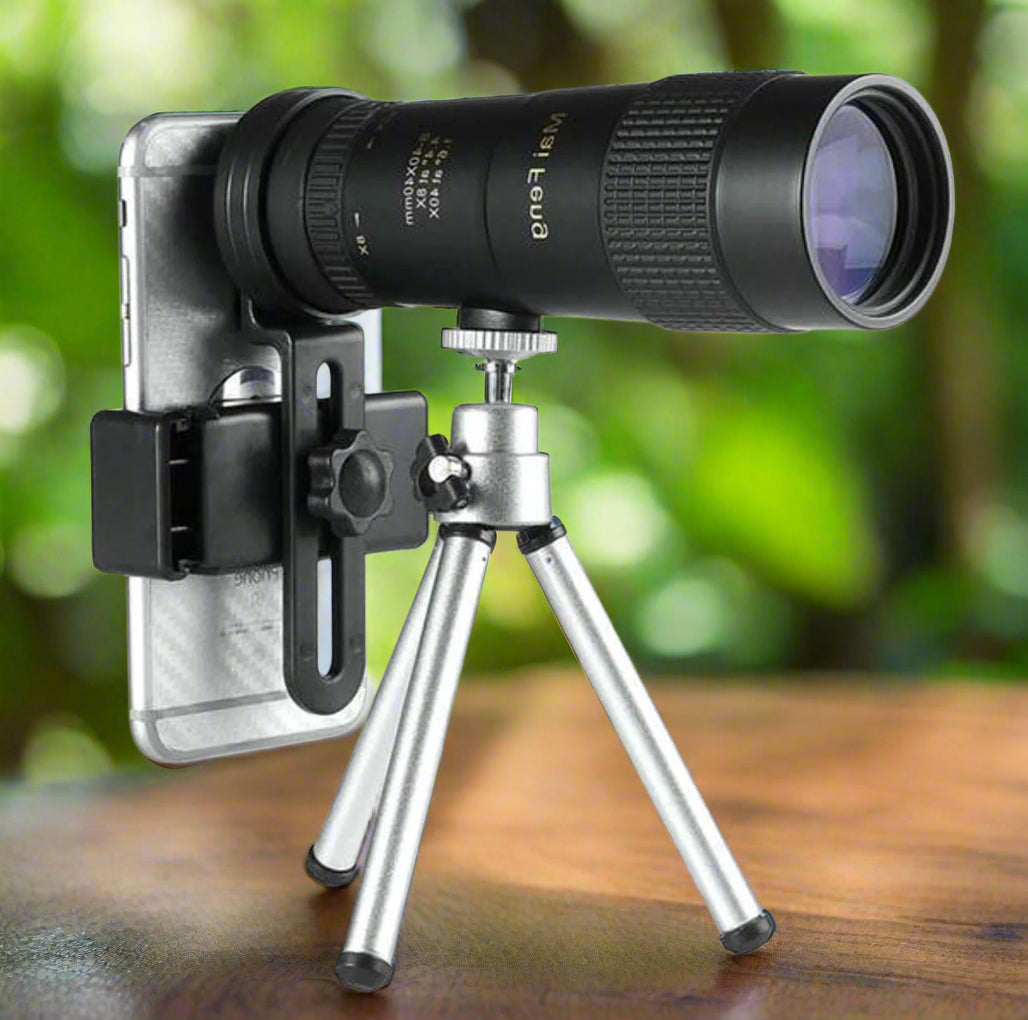 "Compact waterproof monocular telescope with 10x zoom, night vision, and smartphone compatibility for outdoor adventures."