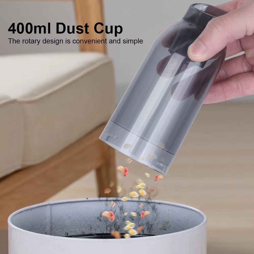 Compact wireless car vacuum cleaner with handle and nozzle for powerful, portable cleaning; sleek design, perfect for vehicle