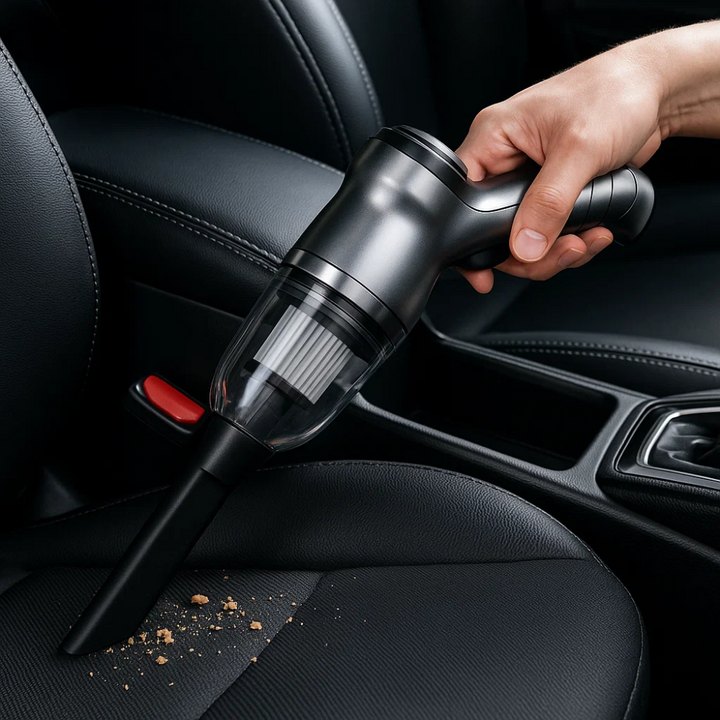 Compact wireless car vacuum cleaner with handle and nozzle for powerful, portable cleaning; sleek design, perfect for vehicle