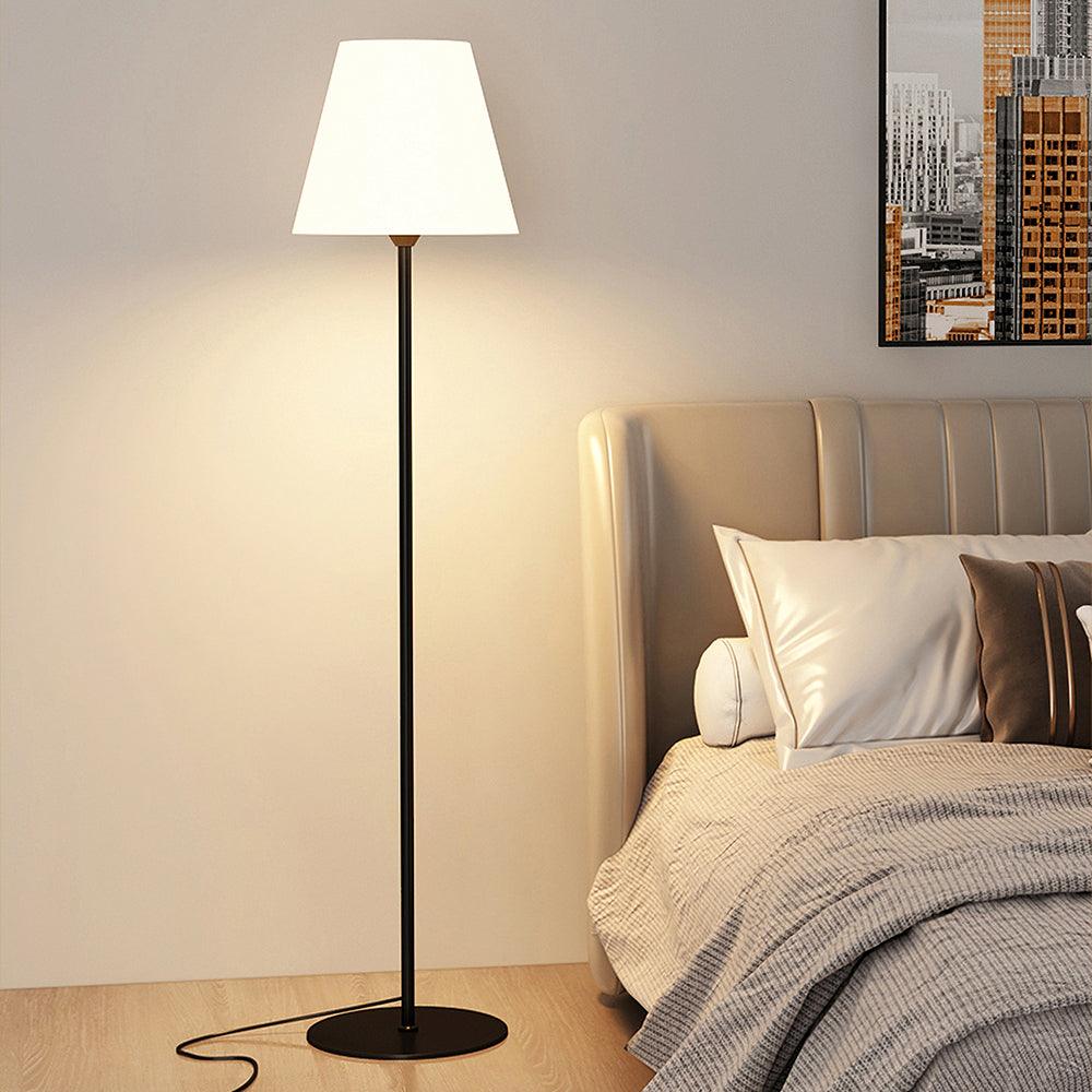 "Contemporary metal and acrylic floor-standing lamp with sleek lines, modern flair, perfect for home decor lighting."
