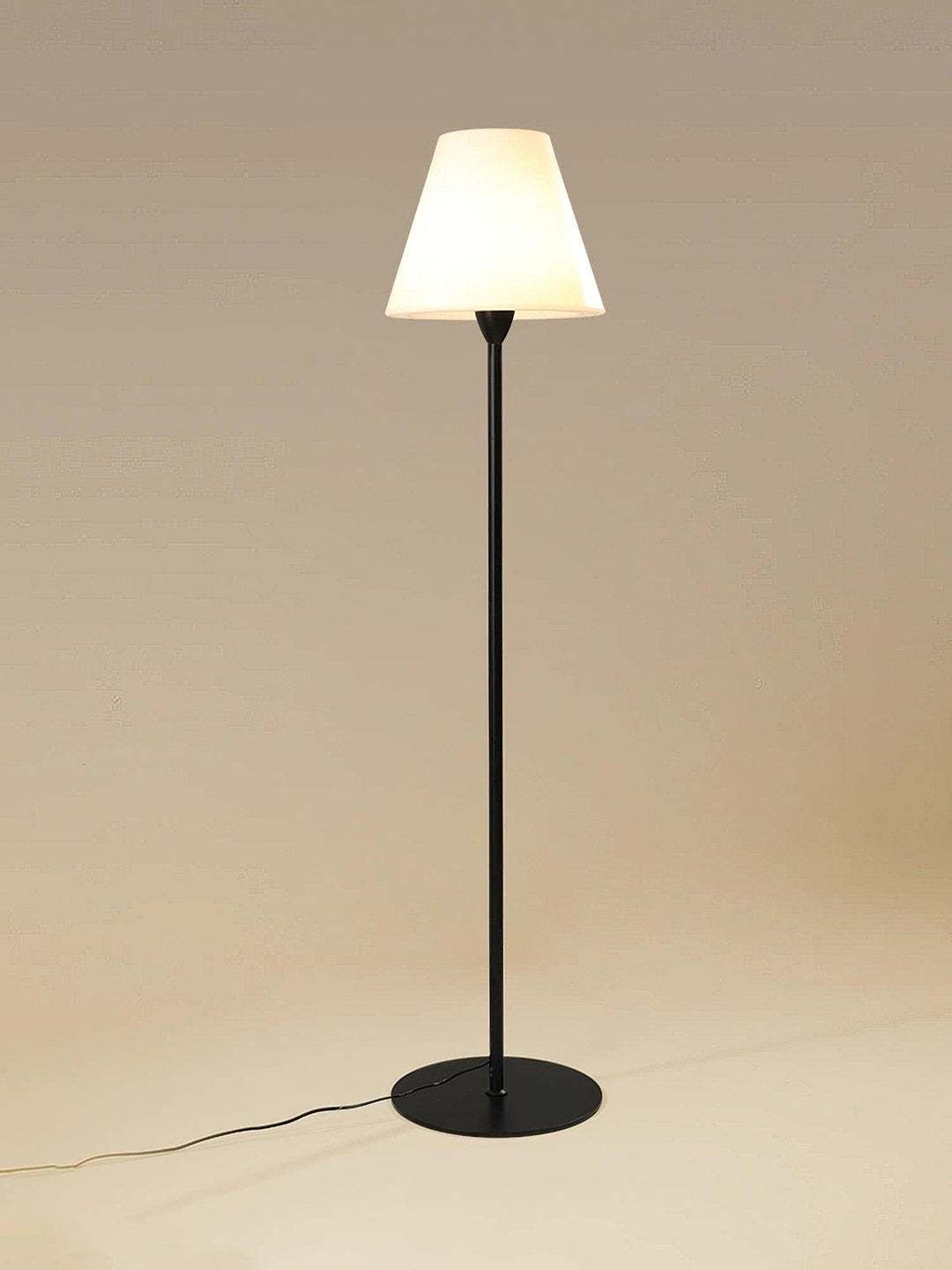 "Contemporary metal and acrylic floor-standing lamp with sleek lines, modern flair, perfect for home decor lighting."