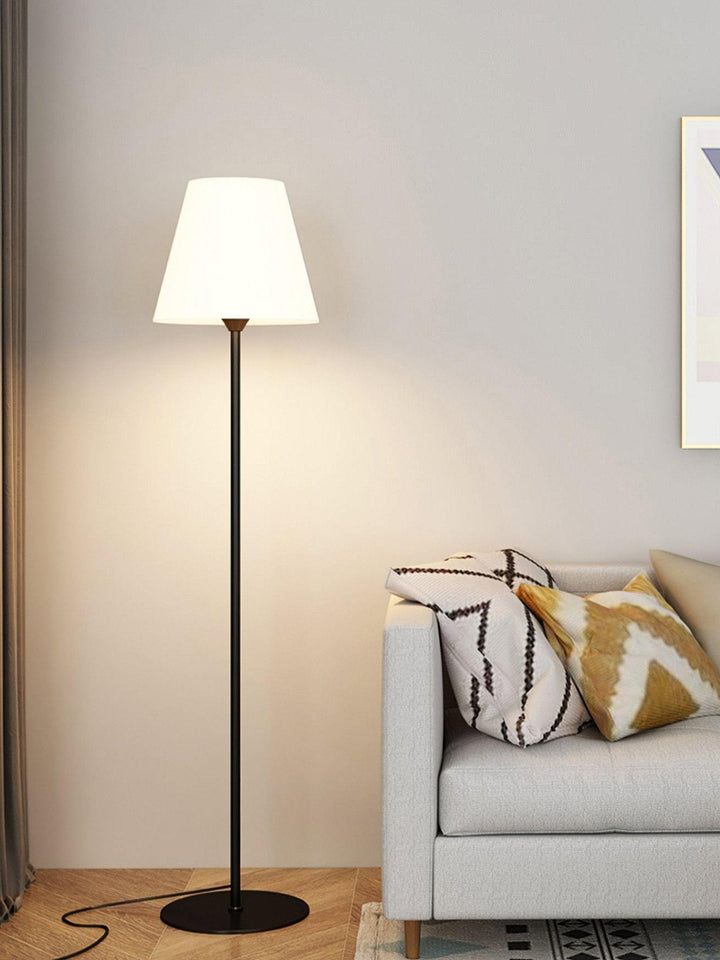 "Contemporary metal and acrylic floor-standing lamp with sleek lines, modern flair, perfect for home decor lighting."
