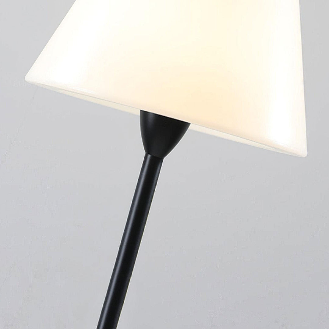 "Contemporary metal and acrylic floor-standing lamp with sleek lines, modern flair, perfect for home decor lighting."