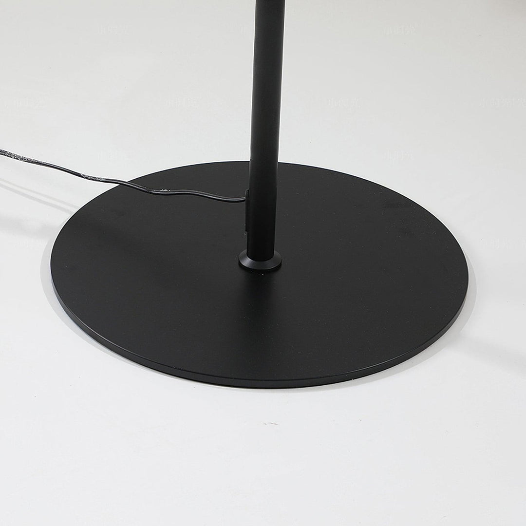 "Contemporary metal and acrylic floor-standing lamp with sleek lines, modern flair, perfect for home decor lighting."