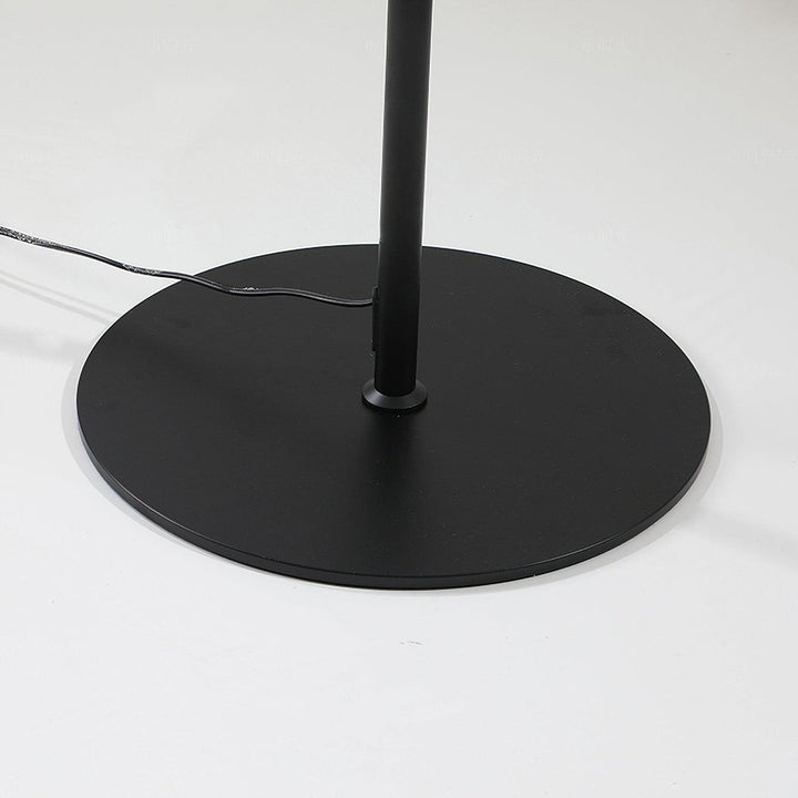 "Contemporary metal and acrylic floor-standing lamp with sleek lines, modern flair, perfect for home decor lighting."