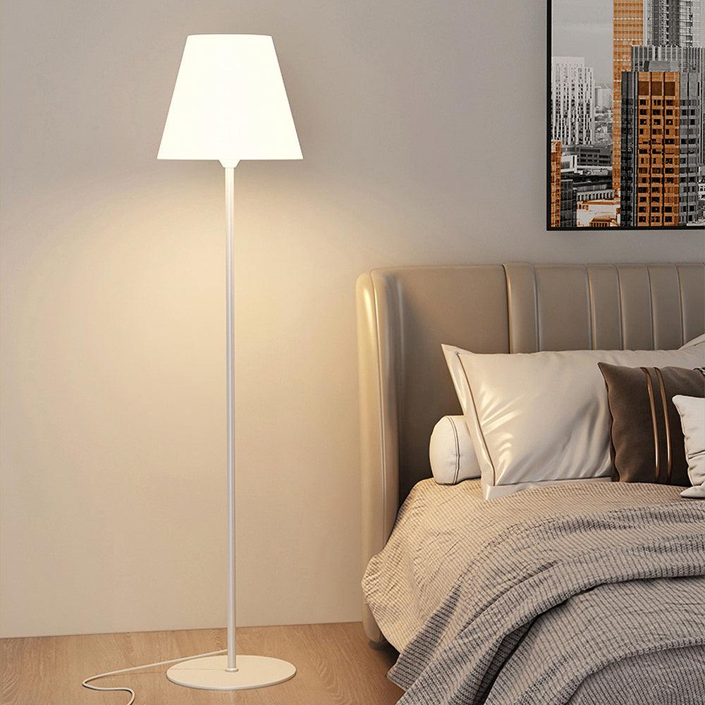 "Contemporary metal and acrylic floor-standing lamp with sleek lines, modern flair, perfect for home decor lighting."