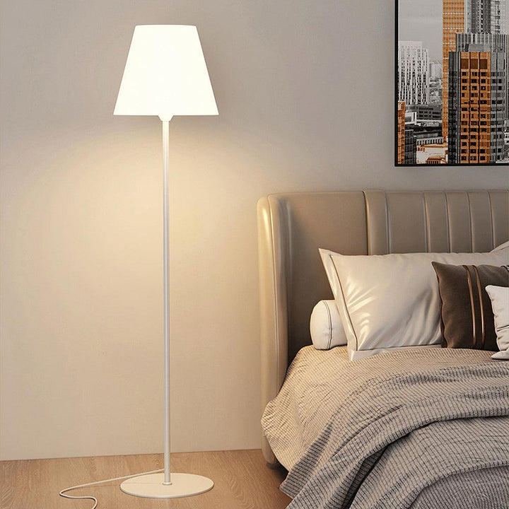 "Contemporary metal and acrylic floor-standing lamp with sleek lines, modern flair, perfect for home decor lighting."