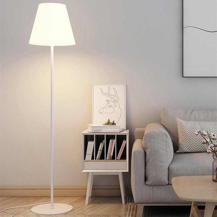 "Contemporary metal and acrylic floor-standing lamp with sleek lines, modern flair, perfect for home decor lighting."