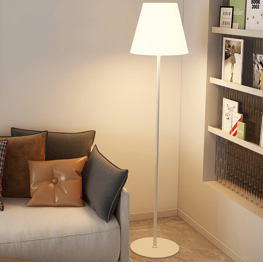 "Contemporary metal and acrylic floor-standing lamp with sleek lines, modern flair, perfect for home decor lighting."