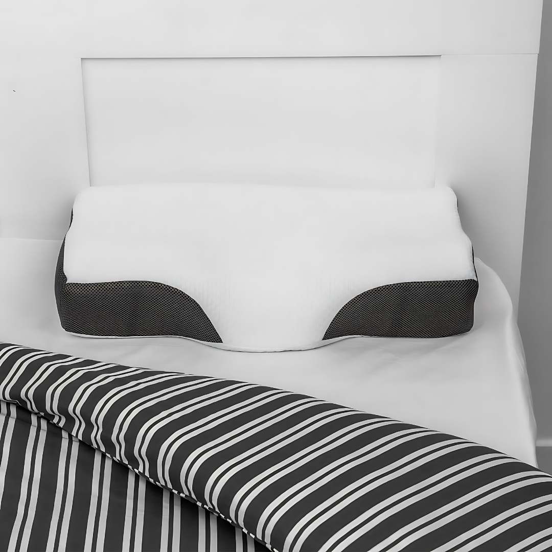 "Contoured memory foam neck pillow for pain relief, featuring spinal alignment support; ideal for better sleep."