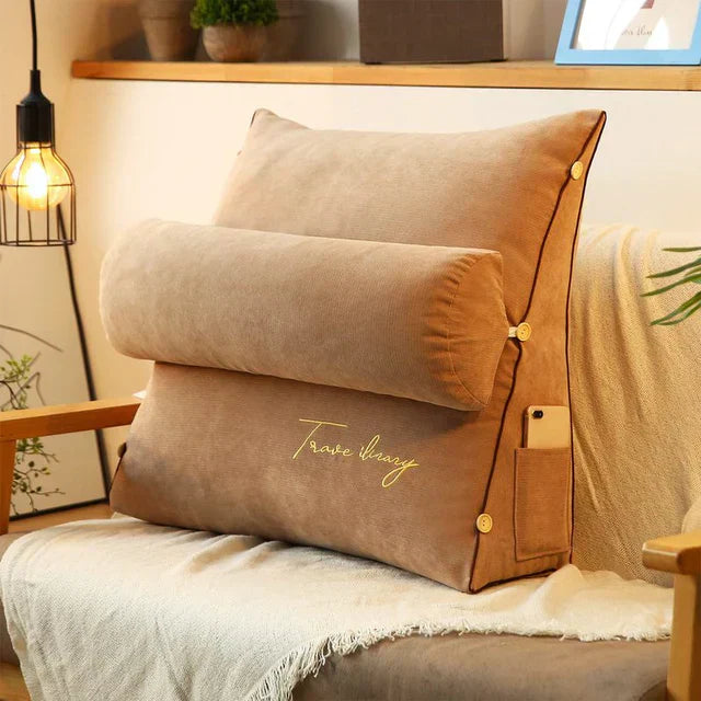 Contoured wedge pillow with ergonomic design, offering back support and a soft fabric cover for comfort and pressure relief.