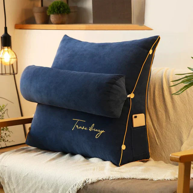 Contoured wedge pillow with ergonomic design, offering back support and a soft fabric cover for comfort and pressure relief.
