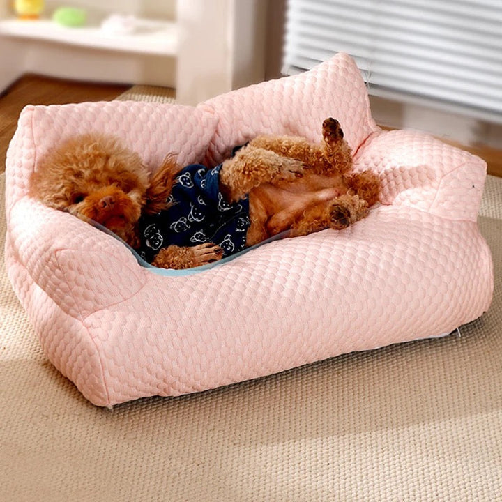 Cooling dog sofa couch with breathable fabric, ergonomic design, and washable cover in stylish colors for pets.