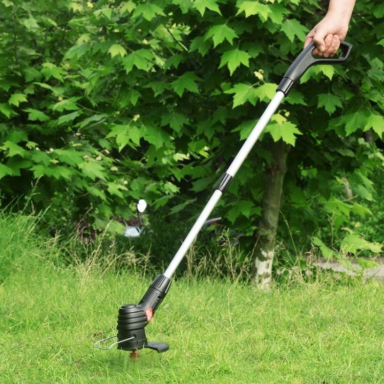 Cordless lightweight grass trimmer with ergonomic handle, high-power battery, and protective blade guard for efficient trimmi