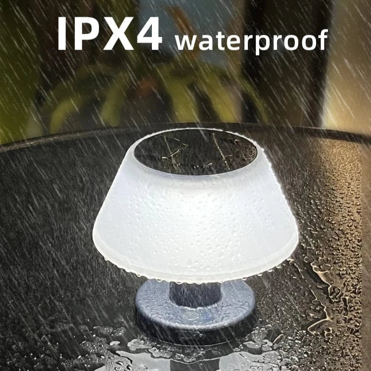 Cordless solar table lamp with LED, rechargeable via USB Type-C, features a sleek, minimalist design, perfect for outdoor use