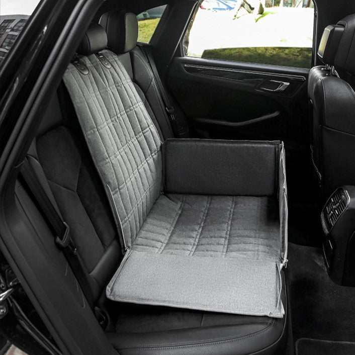 Cozy padded dog car seat basket for safe travel, features secure straps, plush padding, stylish design, ideal for pets.