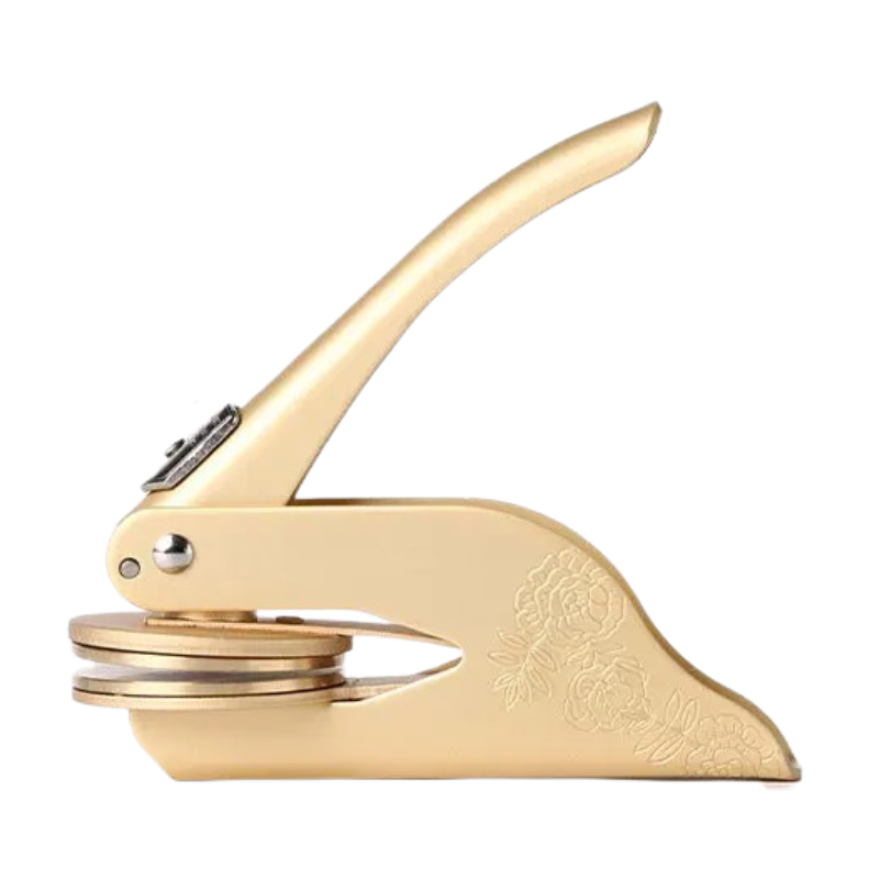 "Custom Library Embosser, brass tool with elegant design, perfect for personalizing books, cards, and stationery."