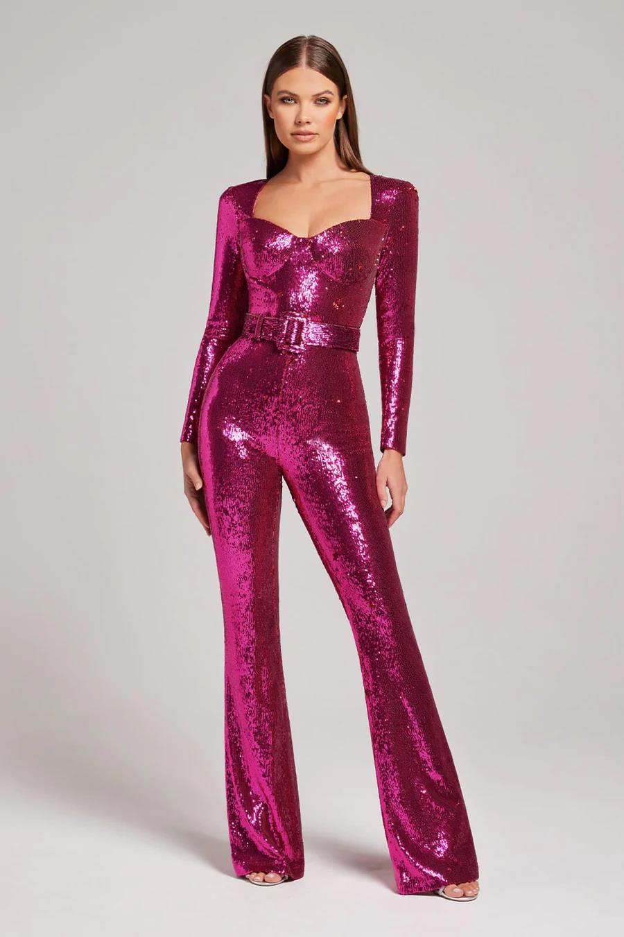Dazzling women's long sleeve sequin jumpsuit with flared legs, perfect for evening events and dramatic style.