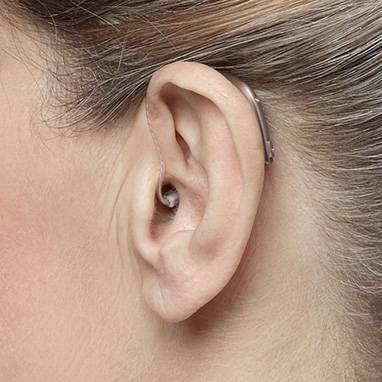 Digital hearing aids with rechargeable feature, sleek design, on a white background, enhances sound clarity and user comfort.