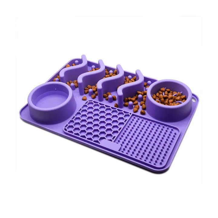 "Dog licking mat MealMaze with suction cups in vibrant black, green, purple colors, promotes digestion and mental stimulation