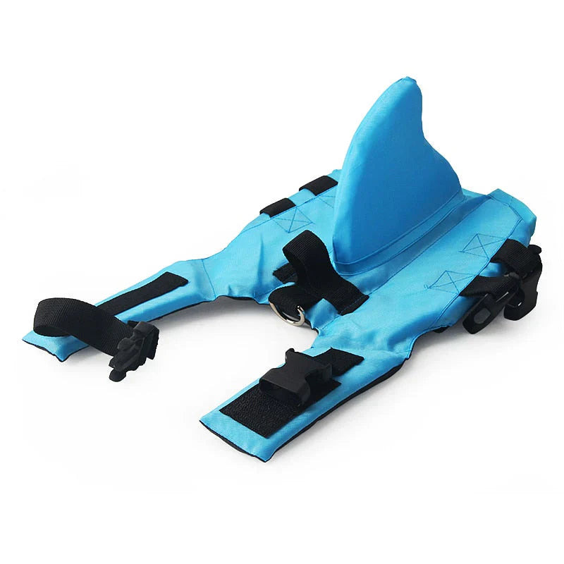 "Dog life jacket with shark fin, vibrant colors, adjustable straps, ensures pet safety and buoyancy in water adventures."