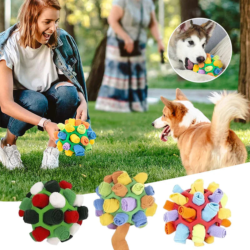 Dog's interactive snuffle treat ball in blue, green, and red, made of plush fleece and durable rubber for engaging playtime.