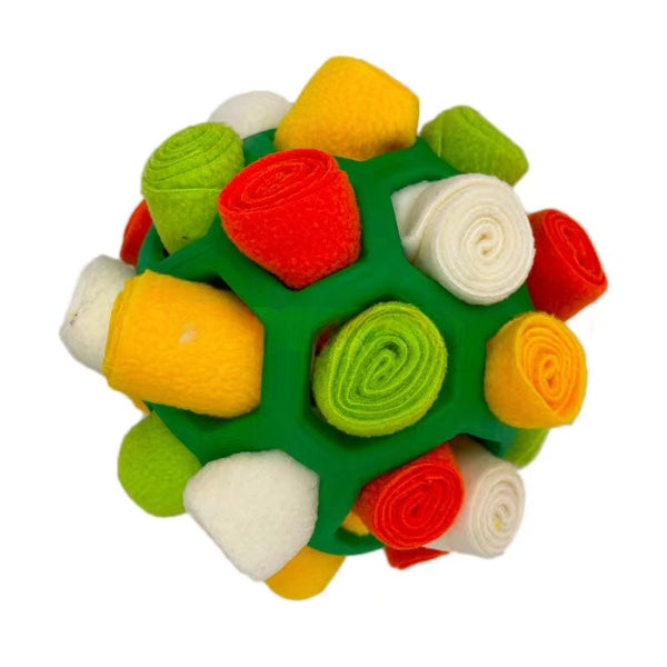 Dog's interactive snuffle treat ball in blue, green, and red, made of plush fleece and durable rubber for engaging playtime.