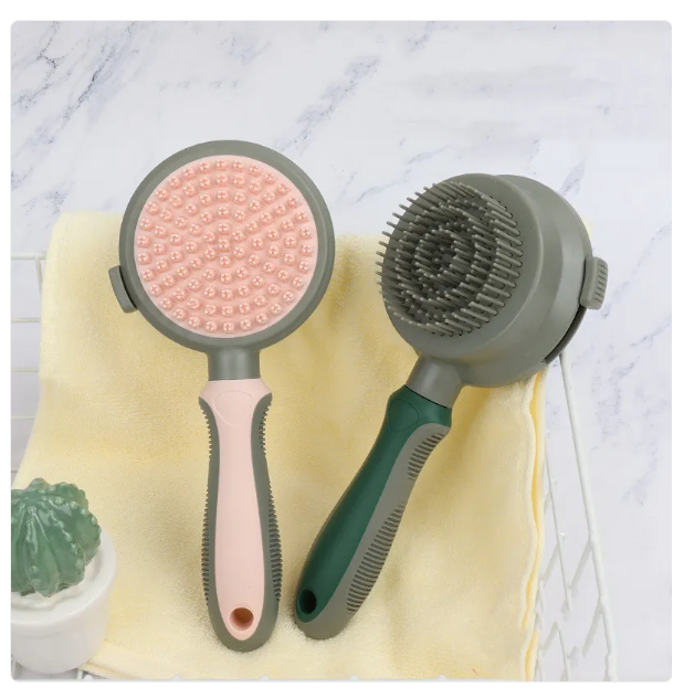 Double-sided cat grooming brush with soft, gentle bristles for long and medium fur; ergonomic handle for easy pet care.