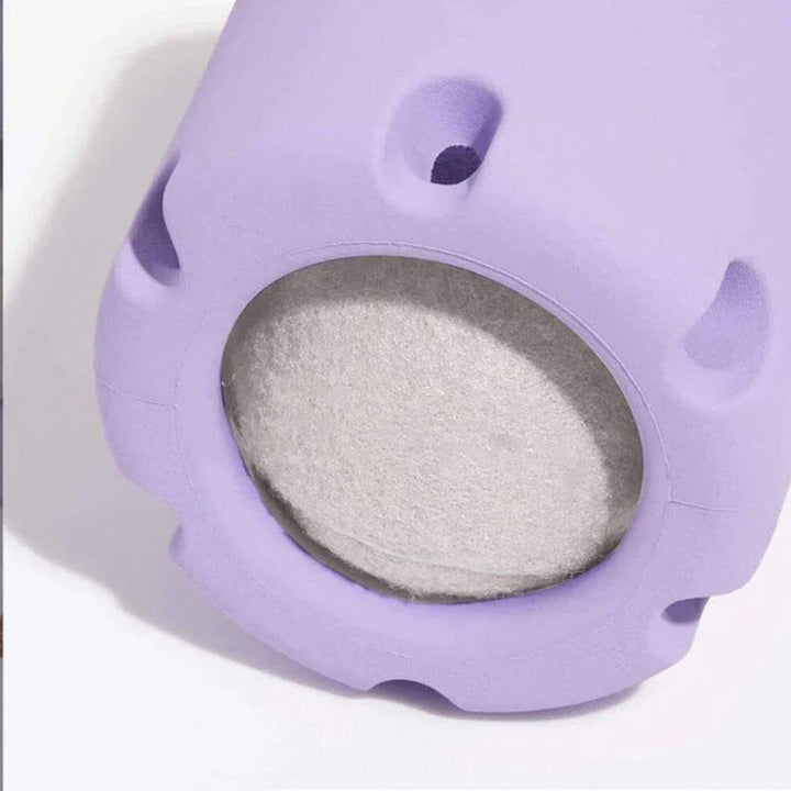 "Durable rubber dog chew toy with hidden tennis ball, designed for interactive play, available in vibrant colours."
