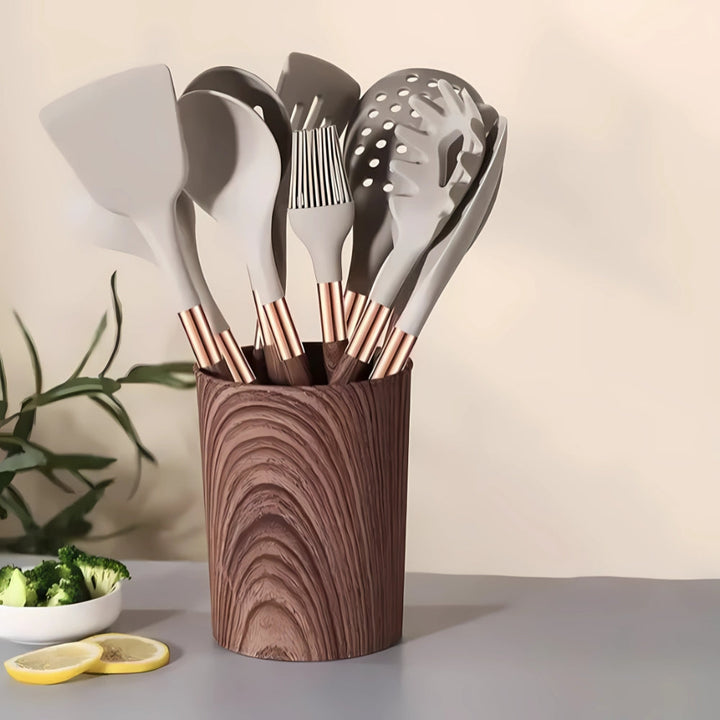 Elegant 10-piece silicone utensil set, heat resistant, features ergonomic handles, minimalist design for modern kitchens.