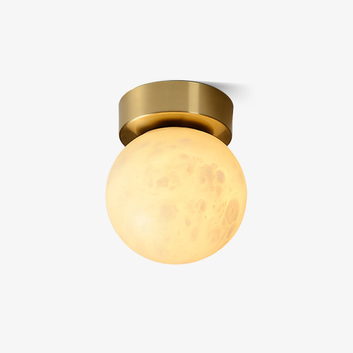 Elegant alabaster brass ceiling lamp, warm ambient light, celestial glow, sophisticated brass detailing, modern design.