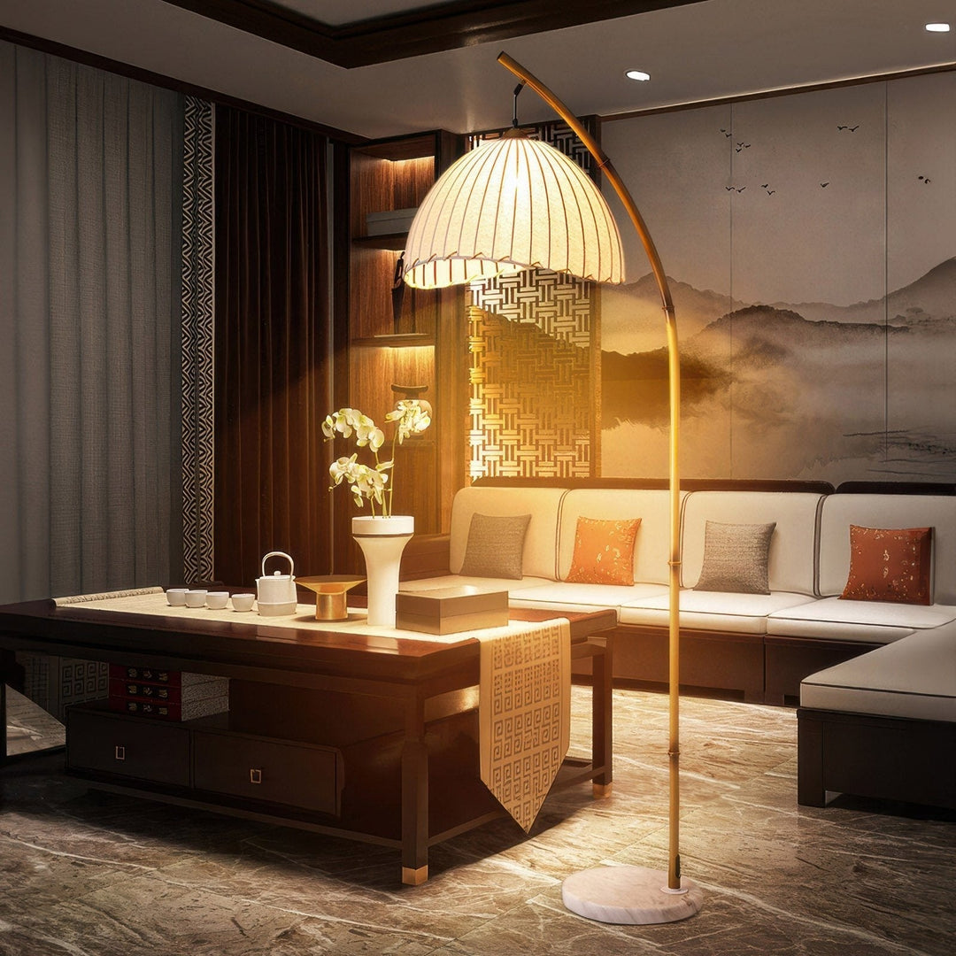 Elegant bamboo floor lamp with fabric shade, offering ambient lighting for a relaxing ambiance in home decor settings.