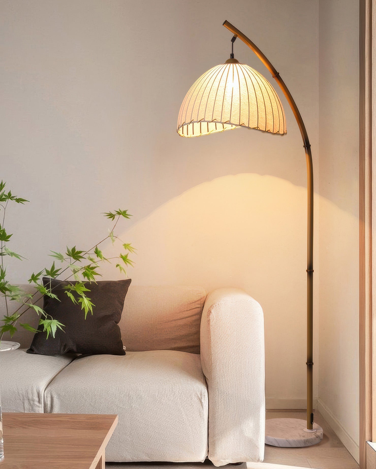 Elegant bamboo floor lamp with fabric shade, offering ambient lighting for a relaxing ambiance in home decor settings.