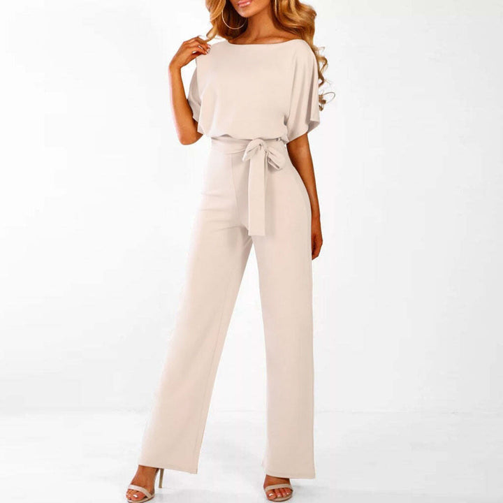 "Elegant black women's belted wide-leg jumpsuit, chic design accentuates waist for a sophisticated look, versatile style."