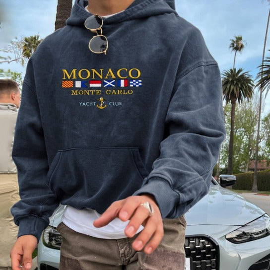 Elegant blue Monte Carlo men's hoodie with embroidery, featuring a refined relaxed fit, perfect for versatile casual style.