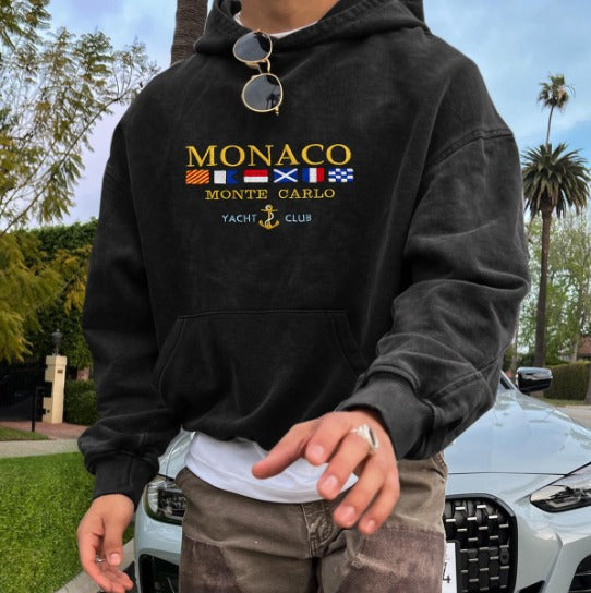 Elegant blue Monte Carlo men's hoodie with embroidery, featuring a refined relaxed fit, perfect for versatile casual style.