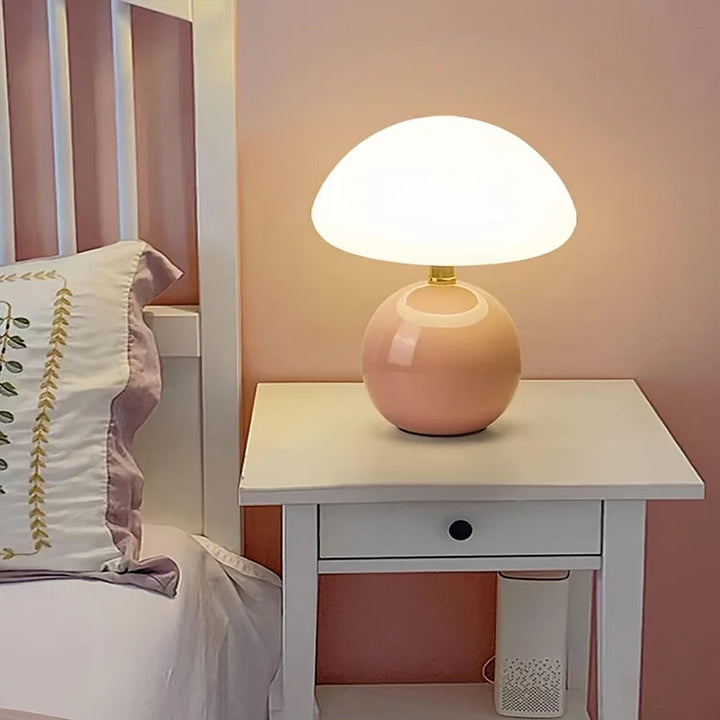 "Elegant French cream mushroom table lamp with adjustable LED colors, inspired by whimsical design and Bauhaus style."