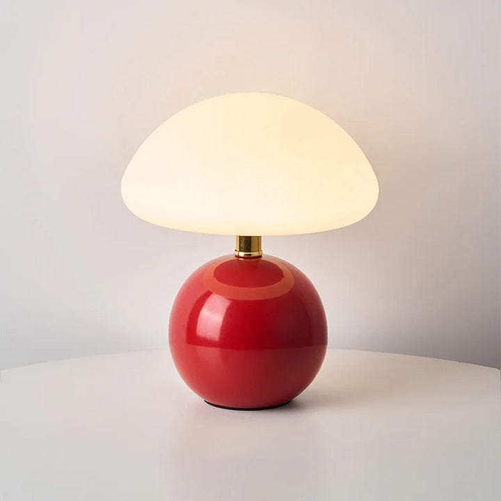 "Elegant French cream mushroom table lamp with adjustable LED colors, inspired by whimsical design and Bauhaus style."