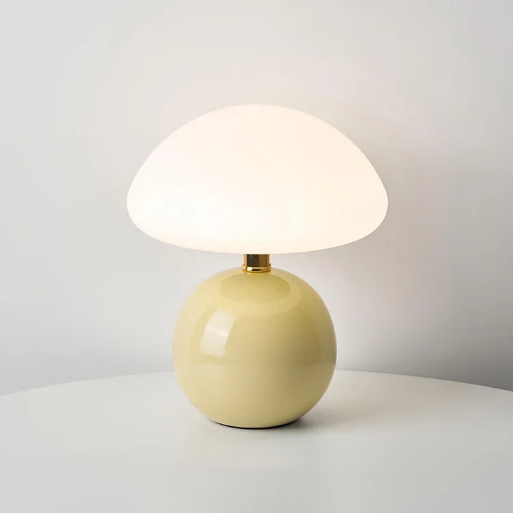 "Elegant French cream mushroom table lamp with adjustable LED colors, inspired by whimsical design and Bauhaus style."