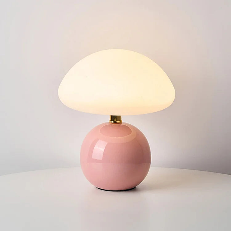 "Elegant French cream mushroom table lamp with adjustable LED colors, inspired by whimsical design and Bauhaus style."