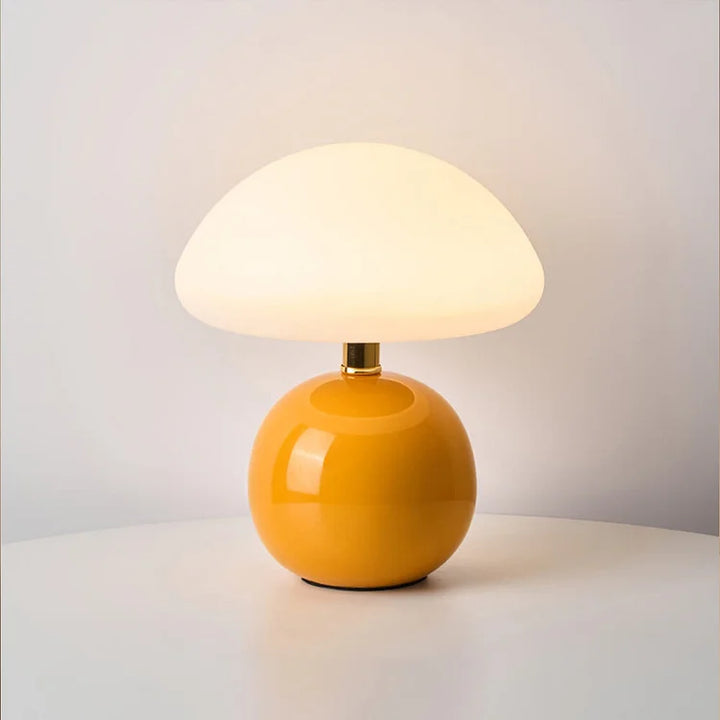 "Elegant French cream mushroom table lamp with adjustable LED colors, inspired by whimsical design and Bauhaus style."