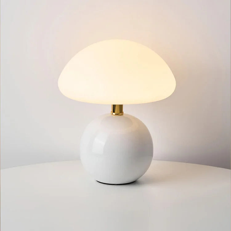 "Elegant French cream mushroom table lamp with adjustable LED colors, inspired by whimsical design and Bauhaus style."