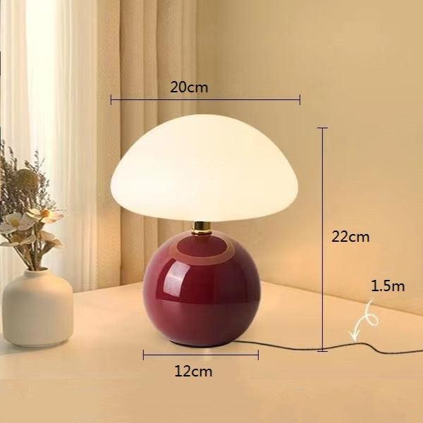"Elegant French cream mushroom table lamp with adjustable LED colors, inspired by whimsical design and Bauhaus style."