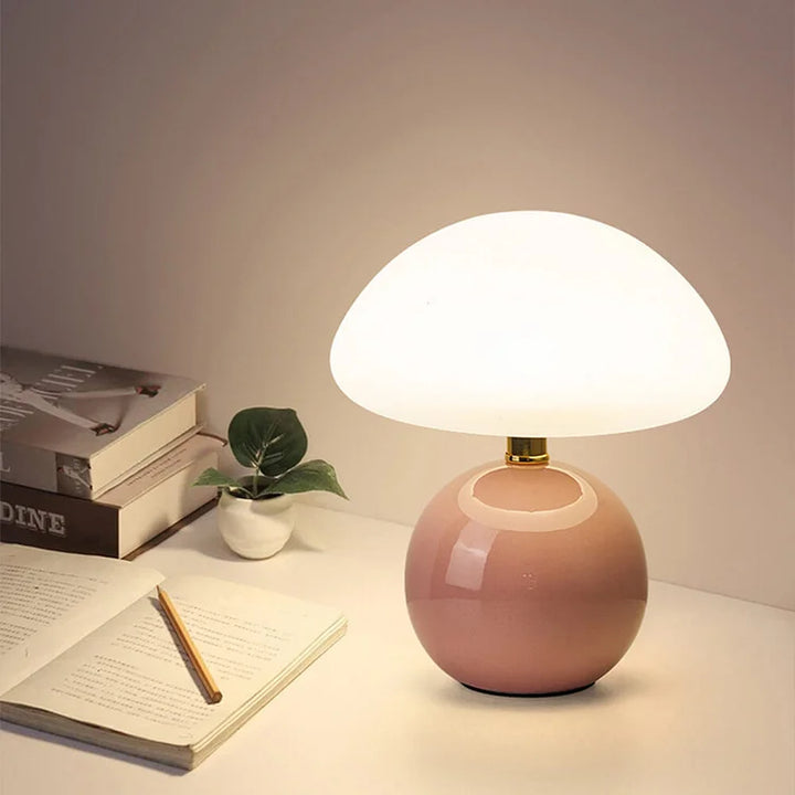 "Elegant French cream mushroom table lamp with adjustable LED colors, inspired by whimsical design and Bauhaus style."