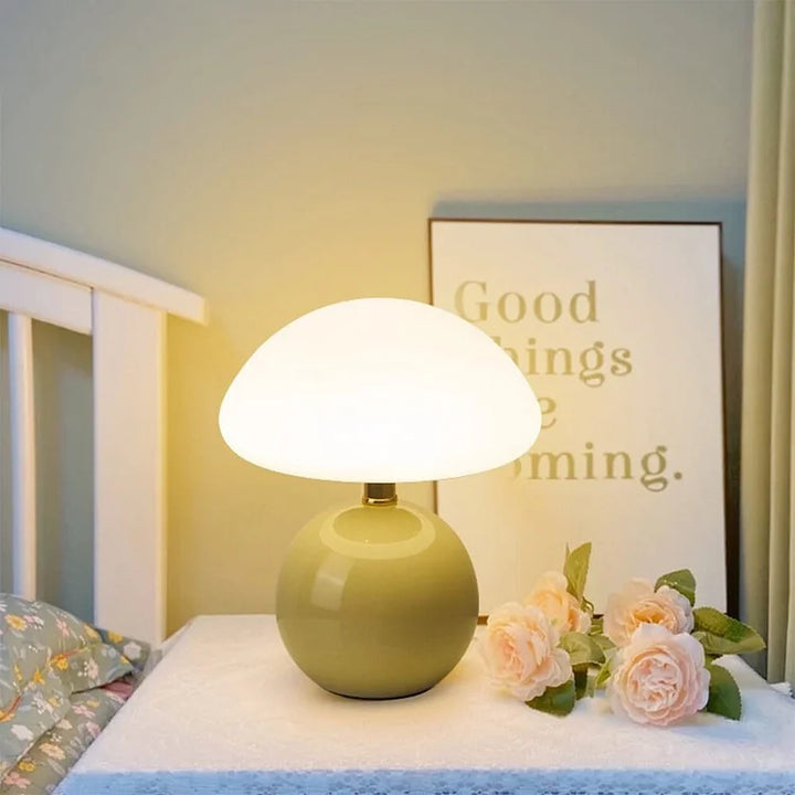 "Elegant French cream mushroom table lamp with adjustable LED colors, inspired by whimsical design and Bauhaus style."