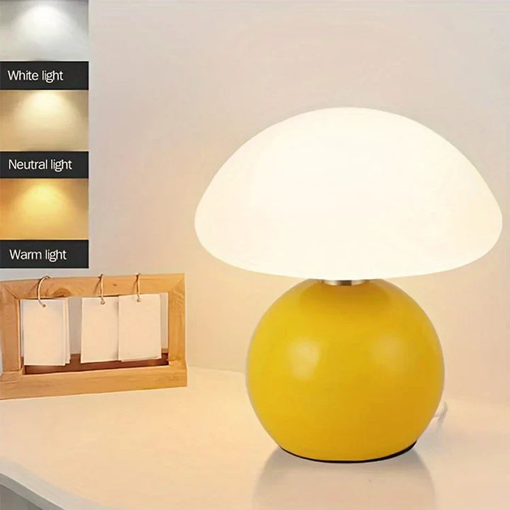 "Elegant French cream mushroom table lamp with adjustable LED colors, inspired by whimsical design and Bauhaus style."
